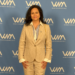 alt: "Claudia Azola, gerenta de Seguridad y Sustentabilidad de ENAMI, reconocida en el WIM 100"
